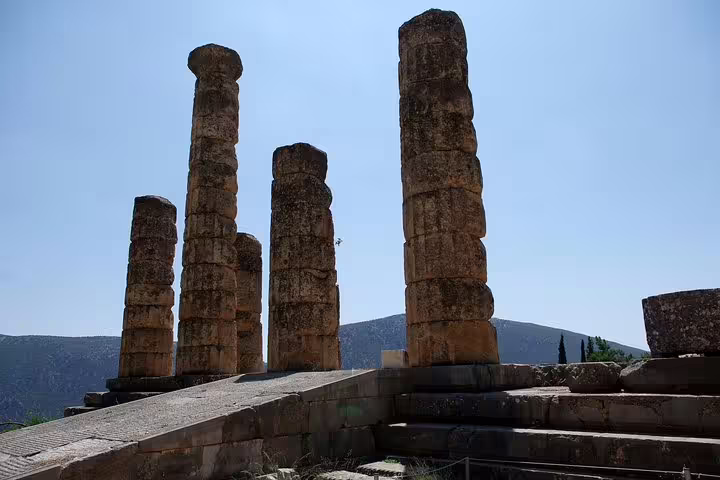 Ancient Temple of Apollo columns at Delphi, Greece, on a private day tour from Athens with Arachova stop