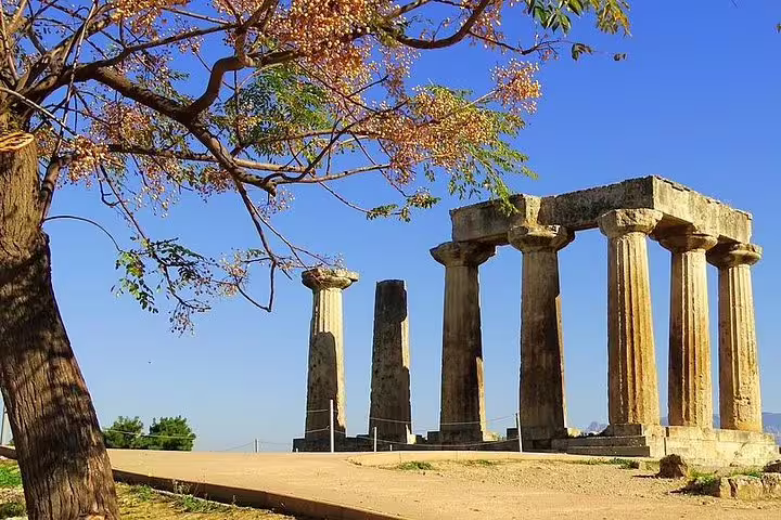 Ancient Temple of Apollo ruins in Corinth, scenic stop on private Corinth Canal day trip with wine tasting