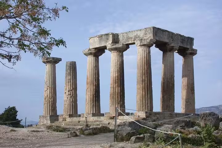 Ancient Temple of Apollo ruins in Corinth, a highlight on the 2-day Peloponnese tour from Athens
