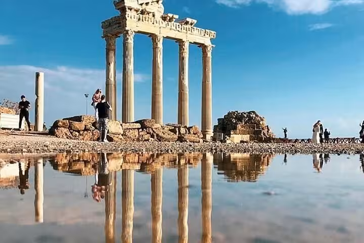 Temple of Apollo ruins in Side reflected in water on private Perge Aspendos Side Manavgat Waterfall tour