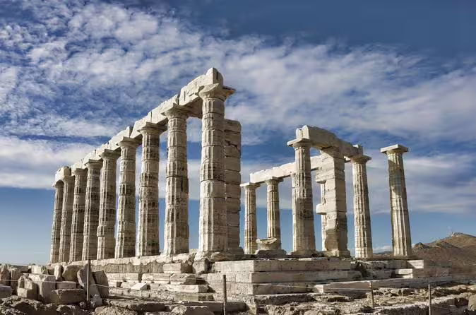 Temple of Poseidon columns at Cape Sounio under blue sky, scenic stop on Athens Riviera private day tour