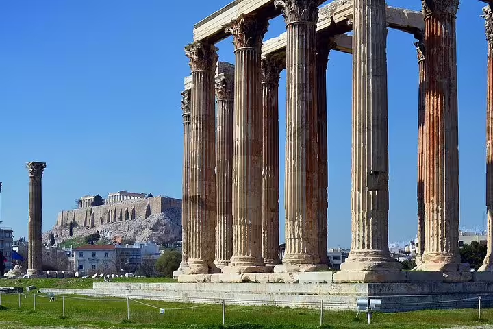 Temple of Olympian Zeus columns with Acropolis in the background, featured on Athens highlights private half-day tour