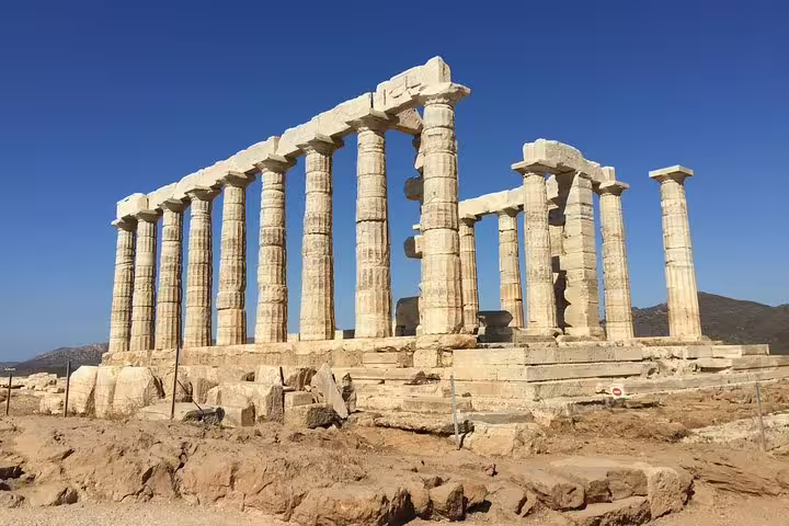 Temple of Poseidon at Cape Sounio on Athens full-day private tour, ancient Doric columns under blue sky
