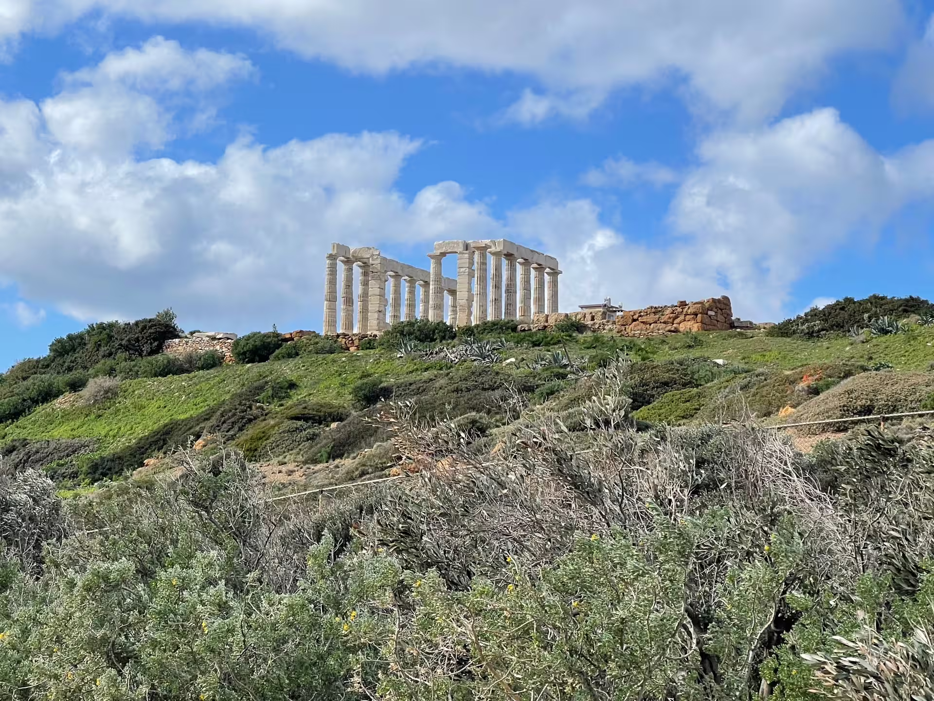 Temple of Poseidon at Cape Sounio on a private Athens panorama tour, scenic coastal drive and views
