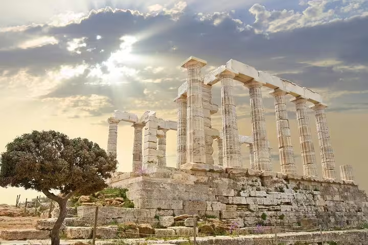 Temple of Poseidon at Cape Sounion in golden light, Athens Riviera day tour with scenic coastal views