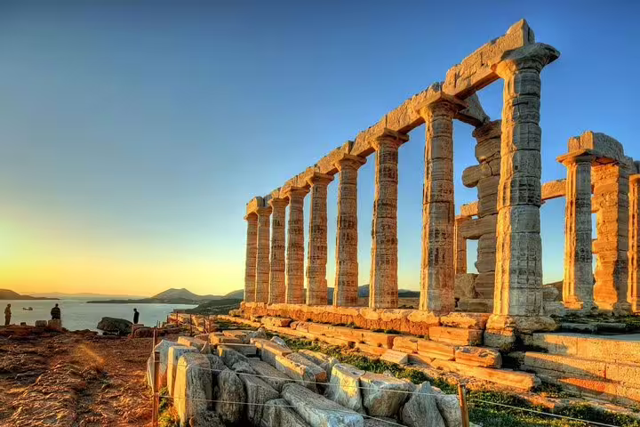 Temple of Poseidon at Cape Sounio at sunset, highlight stop on private tour from Athens with Greek food