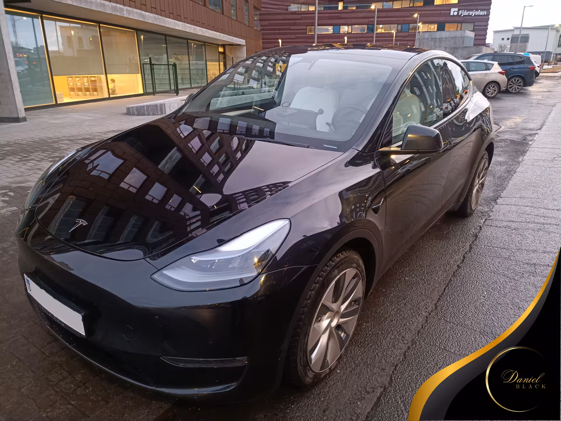 Black Tesla private airport transfer in Reykjavík for KEF Keflavík International Airport, premium electric ride