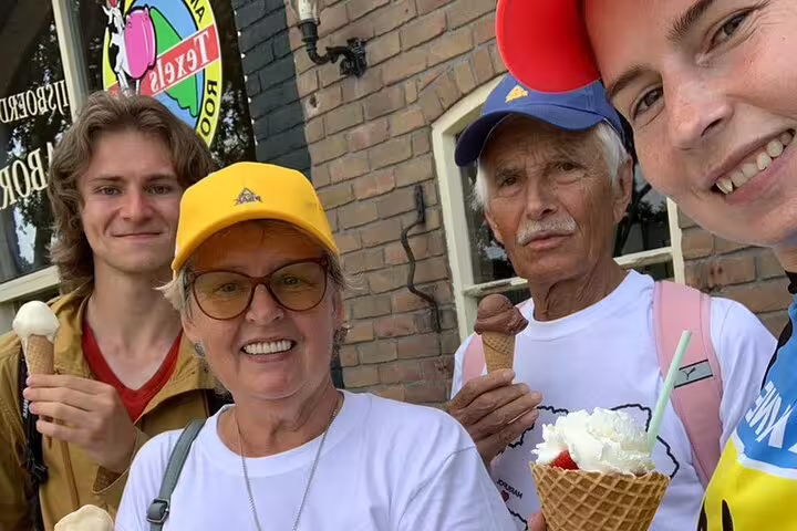 Tour group enjoying Texel ice cream in Den Burg, friendly guided Texel day tour with local tastings