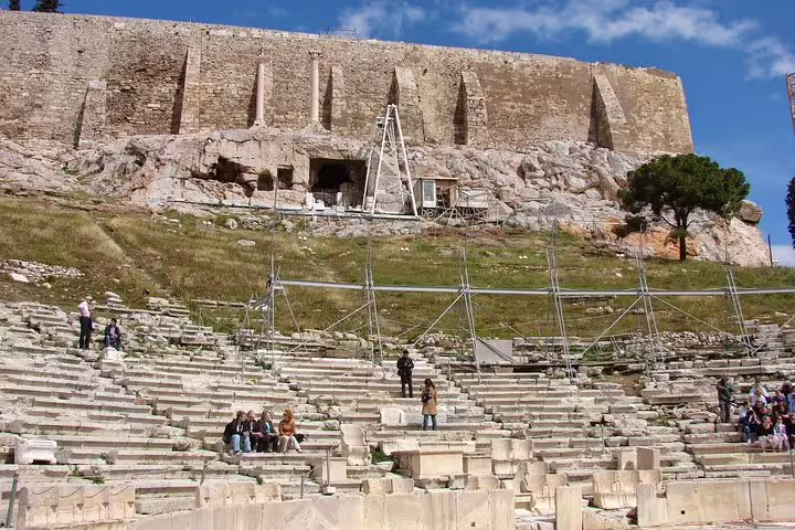 Theatre of Dionysus seating on Acropolis skip-the-line tour with German-speaking guide in Athens