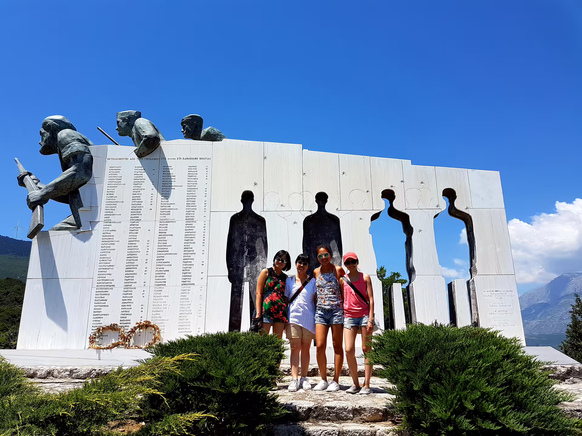 Visitors at the Thermopylae Leonidas Monument on a private Delphi and Thermopylae day tour from Athens