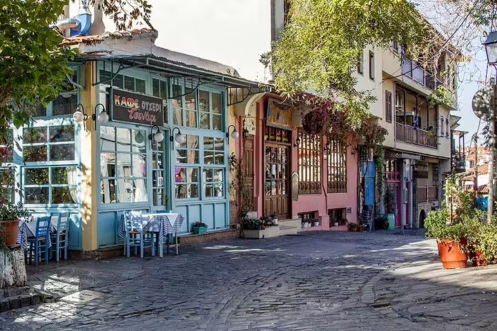 Charming street view in Thessaloniki with colorful cafes, perfect for a custom sightseeing tour during a 2 or 4-hour layover.