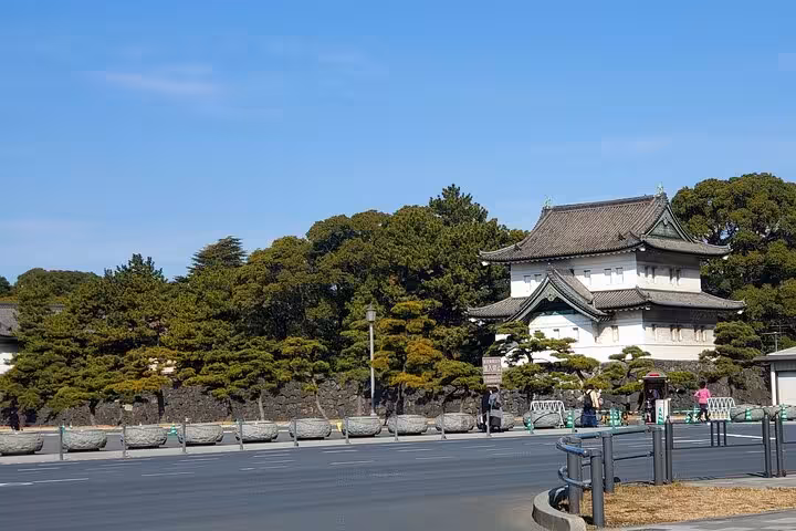Traditional Japanese architecture surrounded by lush greenery in Tokyo, included in the 3-day private tour itinerary.