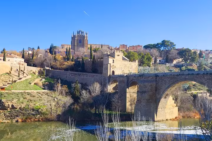 Marvel at the breathtaking views of Toledo's medieval architecture and bridge on a half-day tour from Madrid.