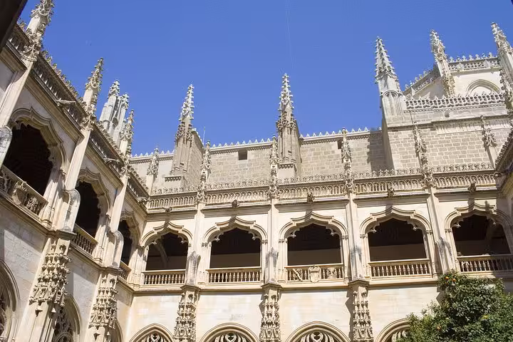 Discover the intricate Gothic architecture of the Monastery of San Juan de los Reyes in Toledo.