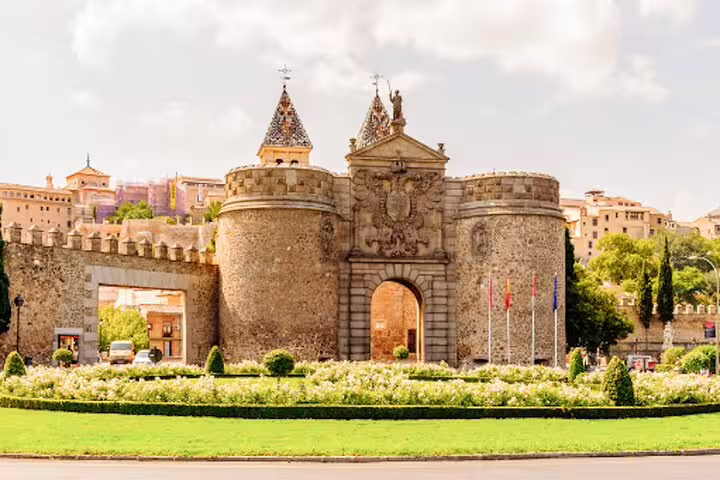 Puerta de Bisagra in Toledo on a private minivan day trip from Madrid, iconic city gate and walls