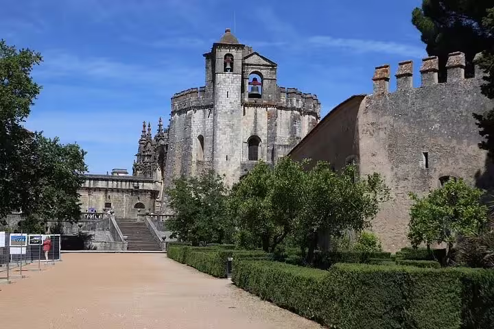 Explore the stunning architecture of the Convent of Christ in Tomar on a guided tour from Lisbon.