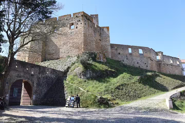 Discover the ancient Castle of Tomar, a key attraction on the Tomar and Mafra Small Group Tour from Lisbon.