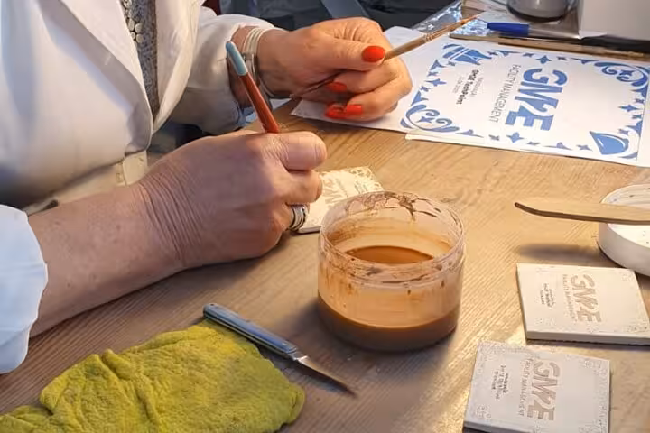 Experience a hands-on tile painting workshop in Tomar, blending creativity with Portuguese artistry.