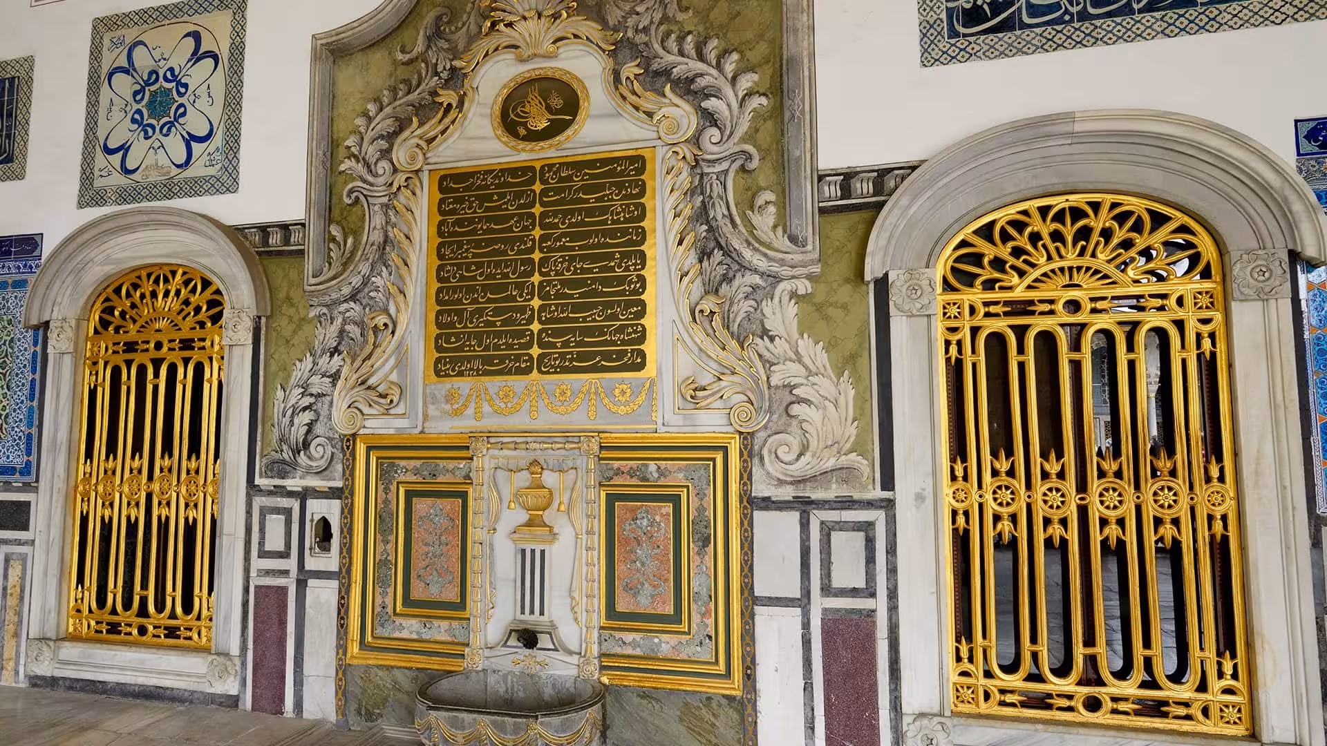 Ornate gold gates and imperial fountain at Topkapi Palace courtyard, Istanbul on 5-day Taste of Turkey tour