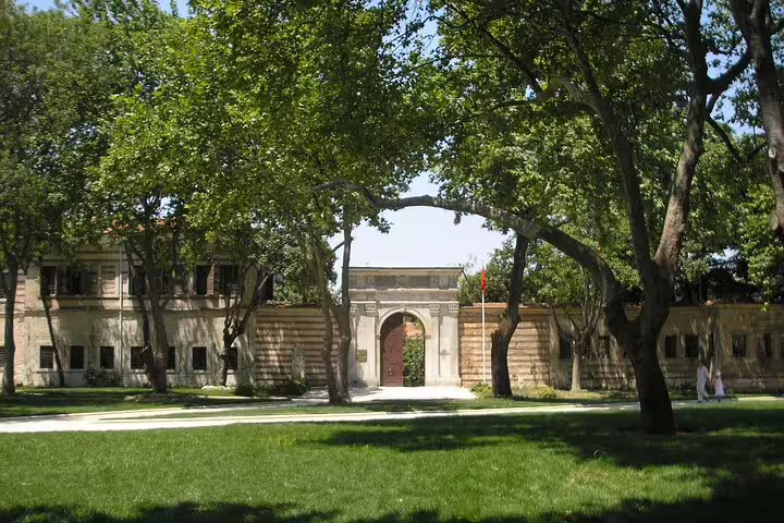 Green courtyard and historic gateway at Topkapi Palace Istanbul on 12-day Turkey private small group tour