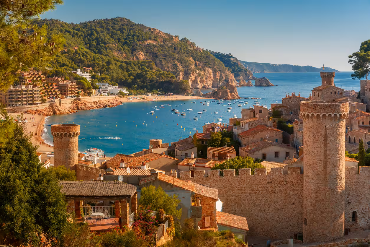 Tossa de Mar medieval walls and bay view, highlight of Girona and Costa Brava full-day tour from Barcelona