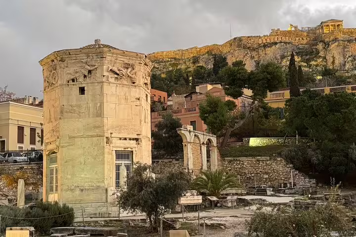 Tower of the Winds in Ancient Agora with Acropolis backdrop, featured on a 2-hour private Athens express tour