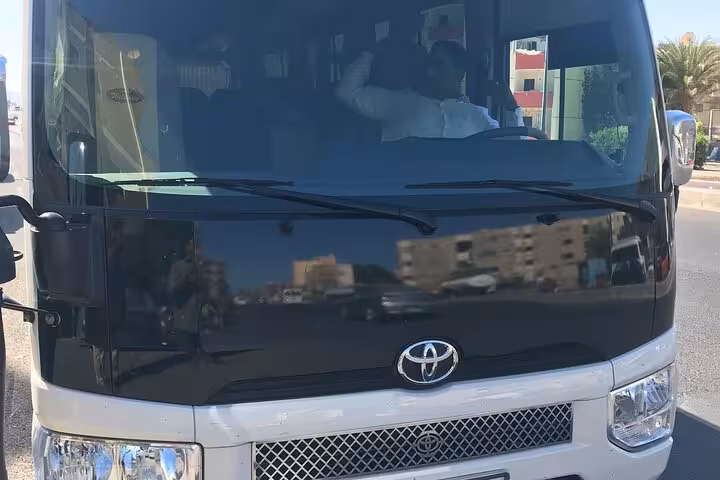 Toyota coaster bus for Hurghada transfer service, spacious group airport shuttle to resorts and hotels on the Red Sea