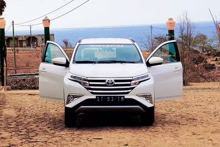 White Toyota private transfer car with open doors, ideal for Boa Vista airport to Sal Rei ride