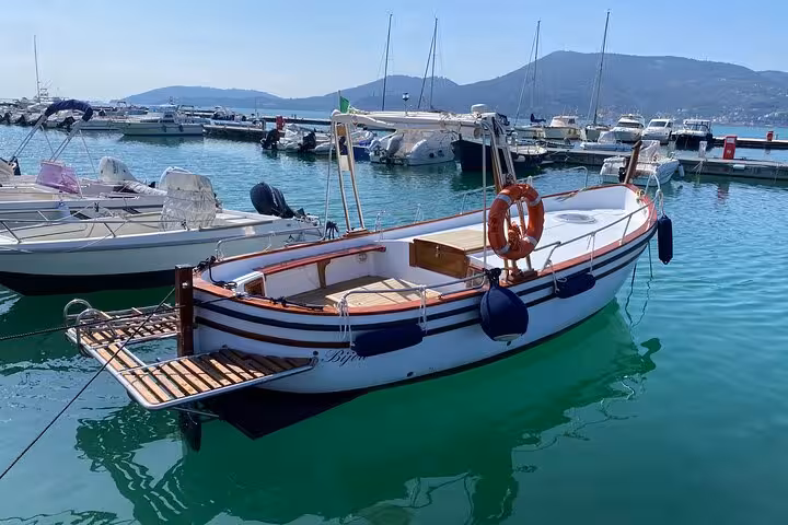Traditional boat docked in La Spezia marina, ideal for exploring Portovenere and Lerici on a scenic boat tour.