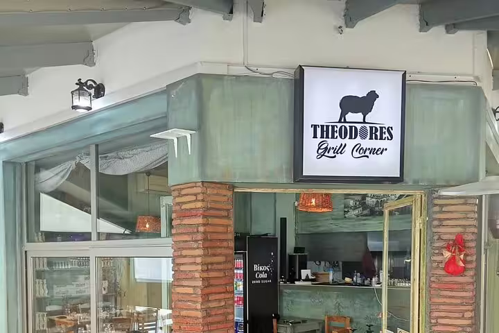 Entrance of a traditional local grill restaurant, ideal for a meat grilling dining experience and food tour
