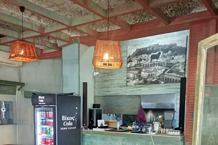 Interior grill corner of a traditional local restaurant, where guests enjoy an authentic grilled meat tour meal