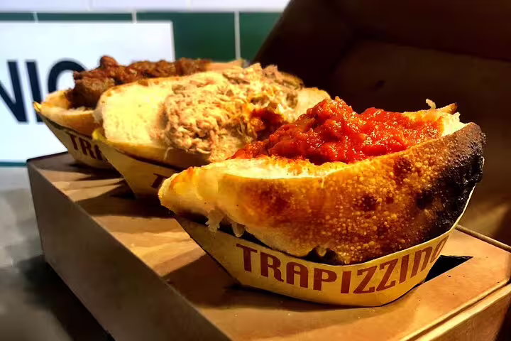 Close-up of savory trapizzini filled with rich Italian toppings, perfect for the Italian Aperitivo Foodie Tour near Vatican.
