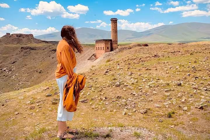 Traveler overlooking Ani Ruins landscape near Kars, Turkey on an all-inclusive private guided 2-day Kars-Ani tour