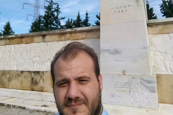 Traveler at Leonidas Monument in Thermopylae, key stop on Meteora and Thermopylae full-day tour with dinner