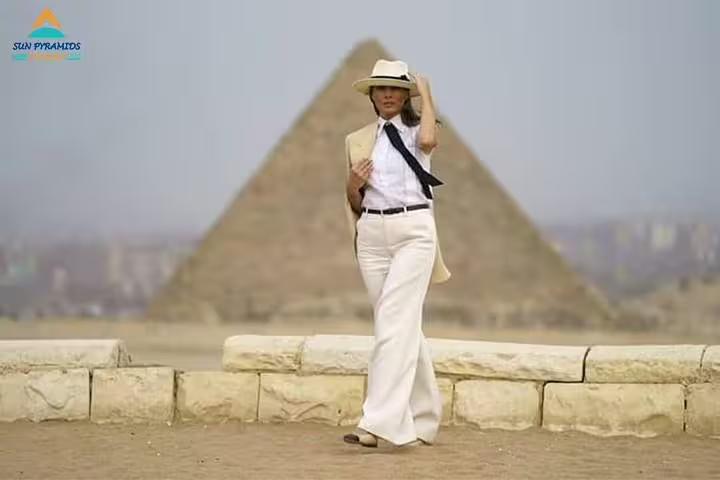 Traveler posing by the Pyramids of Giza during Cairo to Abu Simbel by road package 8 days 7 nights