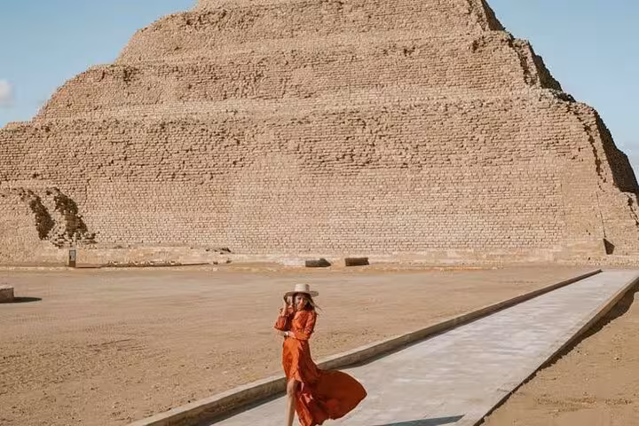 Traveler at Saqqara Step Pyramid complex near Cairo, key stop on Giza Pyramids Saqqara Memphis day tour