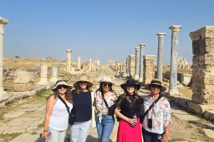 Travelers posing on the marble street of Sardis ruins, part of the 4 Days 7 Churches of Revelation Tour