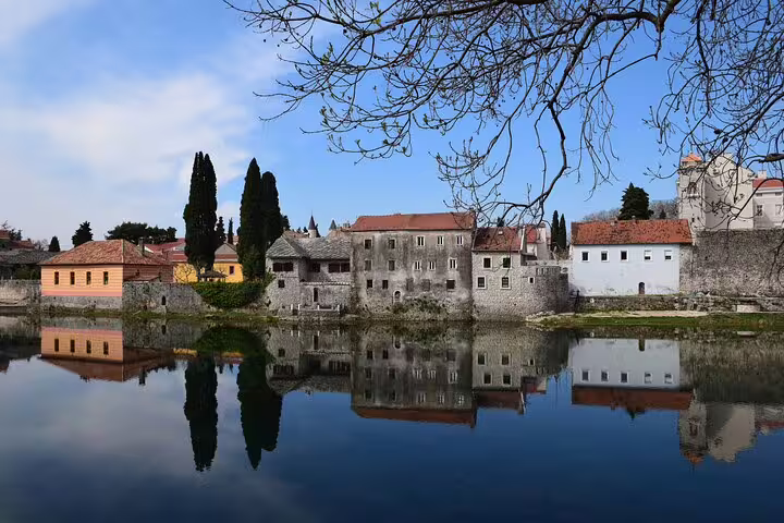Trebinje old town stone houses reflected on the Trebisnjica River, scenic stop on private car tour