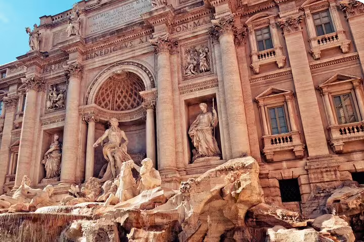 Close-up view of Trevi Fountain baroque sculptures and ornate facade on Rome self-guided audio scavenger hunt tour