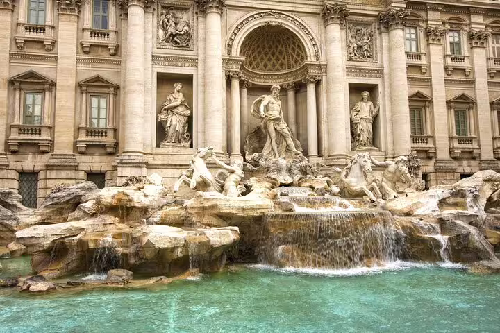 Stunning view of the Trevi Fountain in Rome, showcasing intricate sculptures and cascading water, perfect for your Italian adventure.