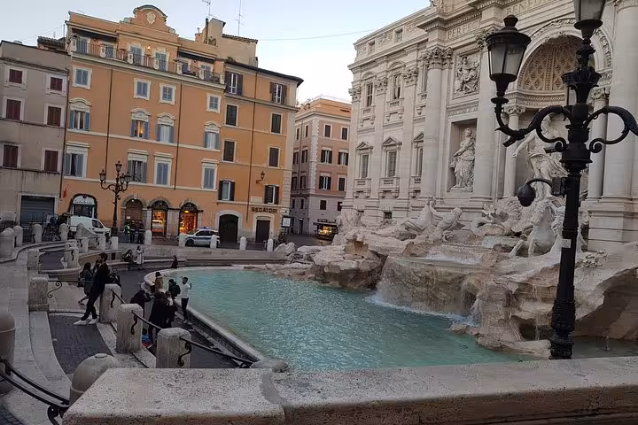 Trevi Fountain in Rome with baroque sculptures and turquoise water, add-on stop for private Tuscany tour