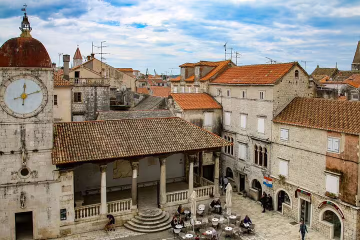 Trogir Old Town square and clock tower, a highlight on Split cruise ship shore excursion to Trogir