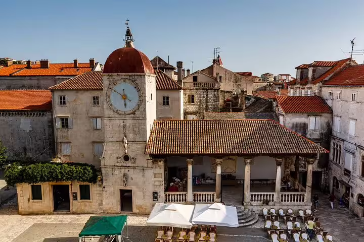 Trogir Old Town clock tower and waterfront square, UNESCO highlight on Split cruise ship shore excursion