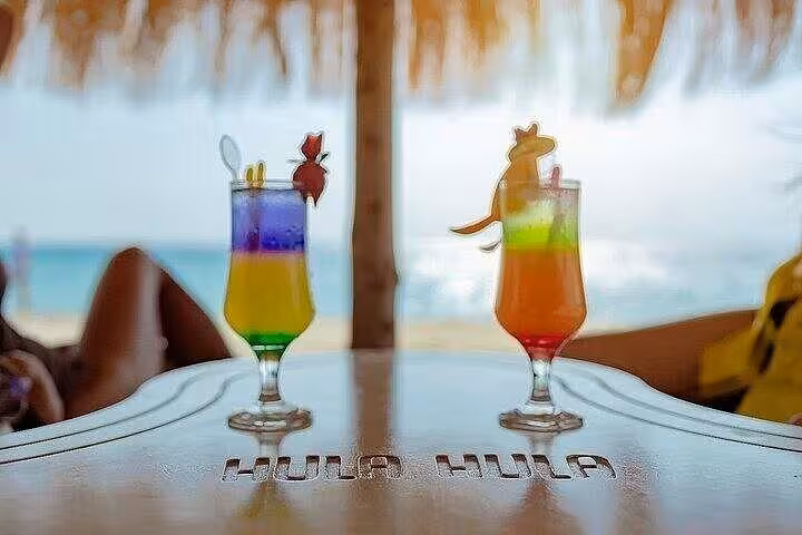 Colorful tropical cocktails on Hula Hula Island Hurghada beach bar, perfect add-on to sea trip with lunch