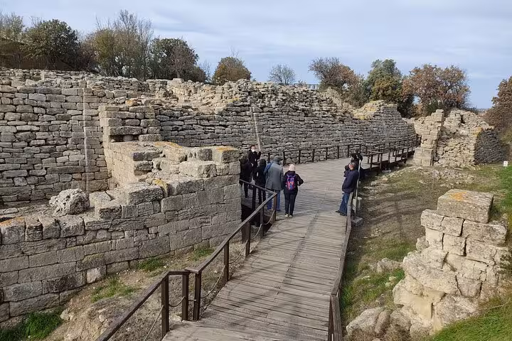 Boardwalk through ancient Troy stone walls during full-day guided Troy tour from Istanbul with lunch