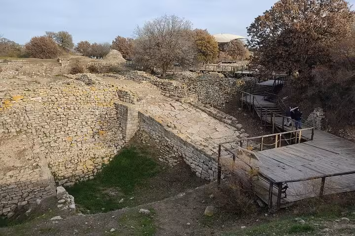 View of Troy excavation walls and boardwalk paths in Canakkale, visited on Istanbul to Troy day trip with lunch