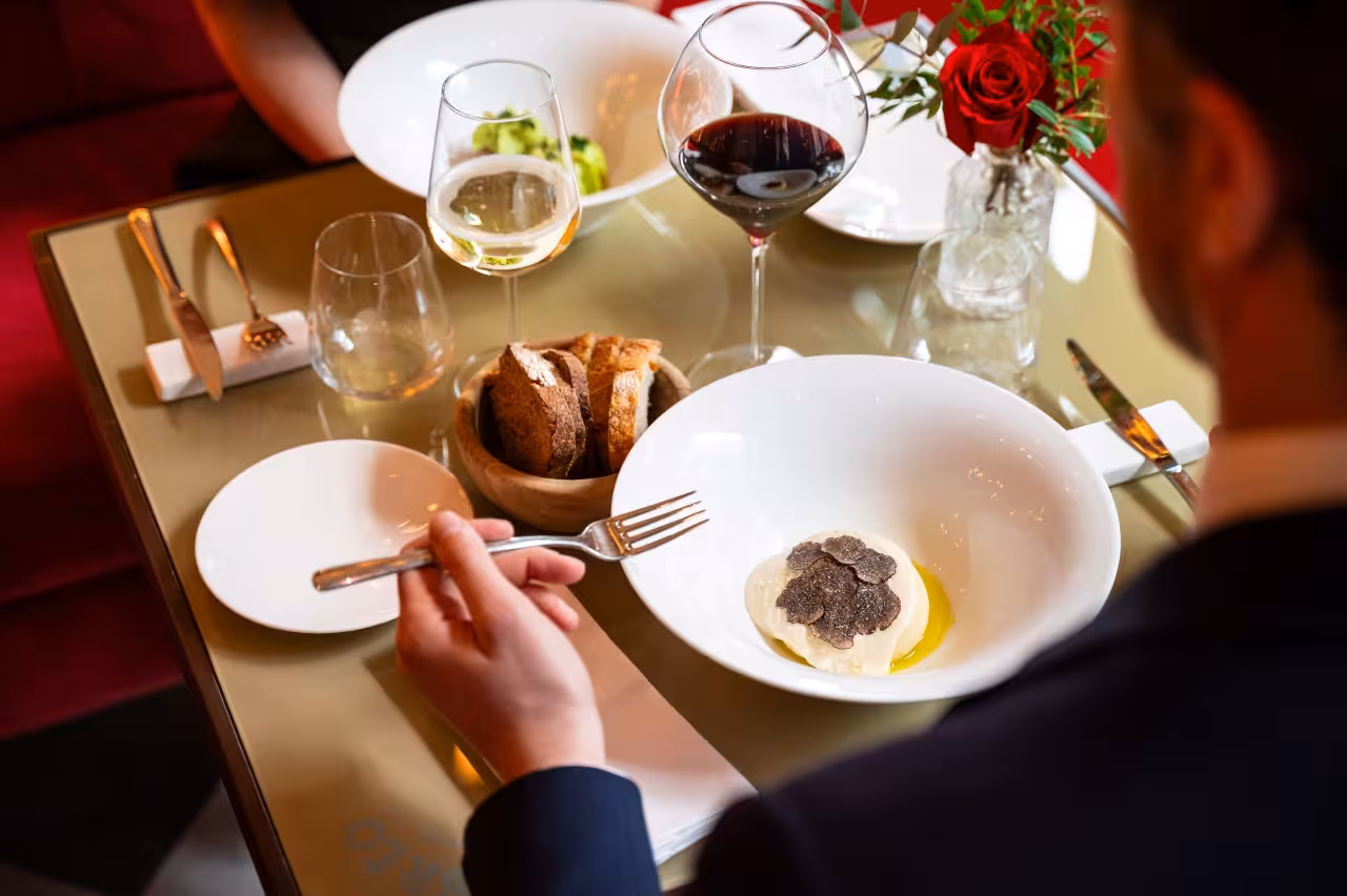 Truffle-topped tasting dish with Tuscan wine at Cibrèo Ristorante & Cocktail Bar culinary experience in Florence