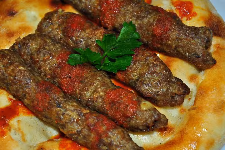 Turkish Adana kebab on lavash with parsley and spicy sauce, a must-try on Turkish food tour