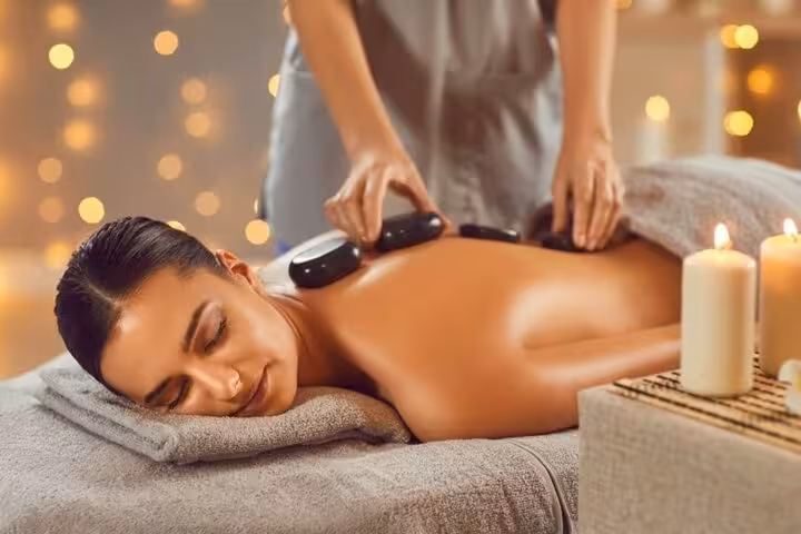 Hot stone body massage in Hurghada Turkish bath spa with sauna, steam room and jacuzzi for full relaxation