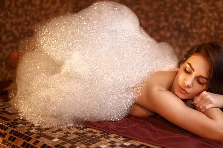 Foam massage on warm marble in Turkish bath spa program Sharm El Sheikh, full hamam treatment and relaxation